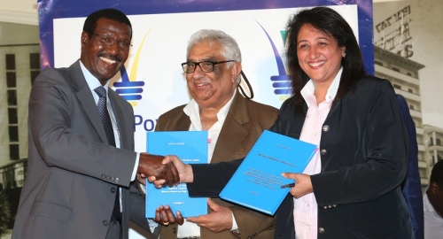 Kenya Power  MD & CEO, Dr. Ben Chumo (left), Polyphase Systems Ltd Directors, Kirtan Saggar (center) and  Anjali Mediratta.